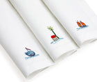 3 Sailor's Farewell linen napkins in the different embroidered designs.