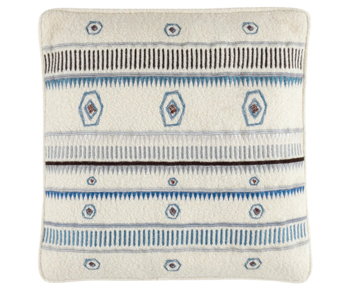  Kit Kemp's Spring Bush Cushion, from her New Forest Collection with Annie Selke, is hand embroidered kilim inspired design, in blue, featuring traditional Anatolian motifs. Made in a soft boiled wool, it brings tactile warmth and eclectic style to any space. 