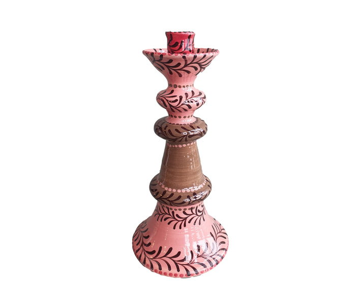 The Chocolate Garland candlestick, by Katrin Moye, has broad contrasting stripes of flamingo pink and brown decorated with hand painted garlands, and is a wonderful additional to any mantel or table setting. Size: H: 23cm Diameter: Base: 12cm