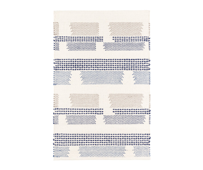 Tonal dotted strips of color on a white ground randomly break at intervals in this witty cotton flatweave rug design