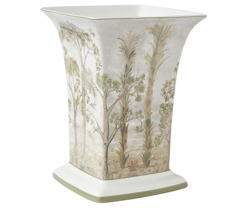 The Tall Trees Square Vase, is wrapped in Kit Kemp's tree top landscape, of billowing leaves and birds in flight, in soft beiges and greens, is a stand out piece, designed to house an abundant bouquet to finish of your table scaping, or just simply to adorn your mantel, it makes a wonderful gift.