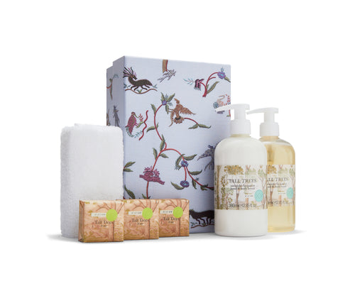 Kit Kemp's Tall Trees Hand Wash Gift Set, combines the zesty thrill of pink pepper with the earthy tones of cedar wood and purple patchouli, to create a scent of gentle well-being. And contains everything you could possible need, with hand wash, lotion, flannel and 3x50g soap, beautifully presented in the Mythical creatures gift box Size: 1 x 380ml Hand Wash, 1 x380ml Hand & Body Lotion 3x 50g Soaps, plus one cotton towelling flannel