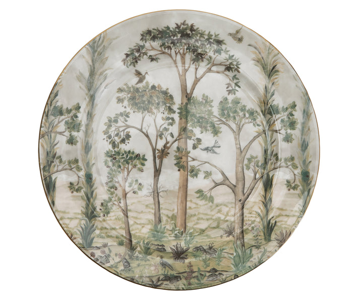 The Fine bone china Dinner Plate with it's tree top view of Kit Kemp's Tall Tree's design, in warm natural beige and green tones, is hand finished in gold. This 12/30cm charger is embellished with the full landscape of the tall tree's design, and forms the foundation piece of these stacking plate design.