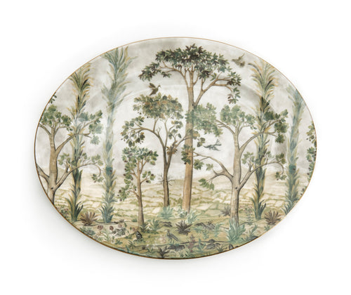 Created from Fine Bone China, with its translucency and superior strength Kit Kemp's Tall Trees Oval Platter, measures 12 30cm in diameter ,is designed to be the center piece of your dining table, whether that be serving dinner with friends, or Sunday lunch with family, it is covered in Kit's tall trees Landscape design in shades of beige and greens, and is hand finished with 24 carat gold along the edge.