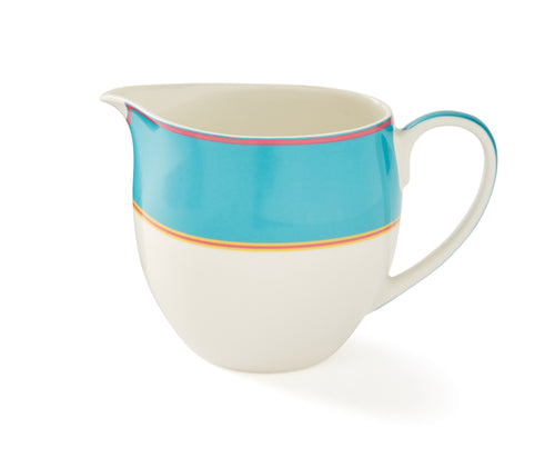 The Turquoise Cream Jug has a elegant curvaceous shape and is topped with a wide Turquoise band, bordered by narrow stripes in pink and yellow, and adds a touch of colour to your breakfast table.