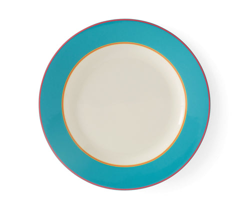 The Turquoise Calypso Side Plate, is a 24cm white plate, with a wide turquoise blue band, bordered by narrow central stripes in pink and yellow, and tipped with a pink outer band. Sold in sets of 4, these plates bring joy and sunshine to your table settings.