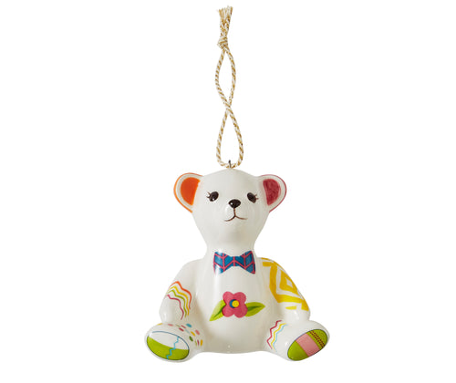 Willow our seated bear white china ornament is inspired by Kit Kemp's patchwork toys and is decorated in bright pastel shades, with a floral design on its belly, yellow diamond patterned arm, and stripes and spots on alternative limbs. 