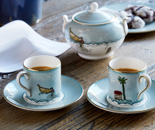 Kit Kemp for Wedgwood. Sailor's Farewell espresso coffee cup and saucer, crafted in fine white bone china are decorated in the whimsical characters from Kit Kempís illustrative story of The Sailorís Farewell, showing sugar bowl in background