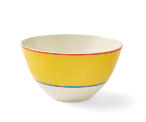 The Yellow Calypso Bowl ,is a deep white bowl, with a wide yellow band, bordered by narrow central stripes in pink and blue, and tipped with a pink outer band. Sold in sets of 4, these plates bring joy and sunshine to your table settings.