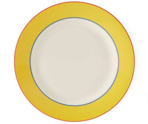 The Yellow Calypso Charger plate, is a large 33cm white plate, with a wide yellow band, bordered by narrow central stripes in pink and blue, and tipped with a pink outer band. Sold in sets of 4, these plates bring joy and sunshine to your table settings.