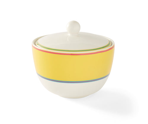 The Yellow Covered Sugar Bowl has a simple domed shape with its wide Yellow band, bordered by narrow stripes in pink and blue, and topped with a elegantly simple white lid, and adds a touch of colour to your breakfast table.